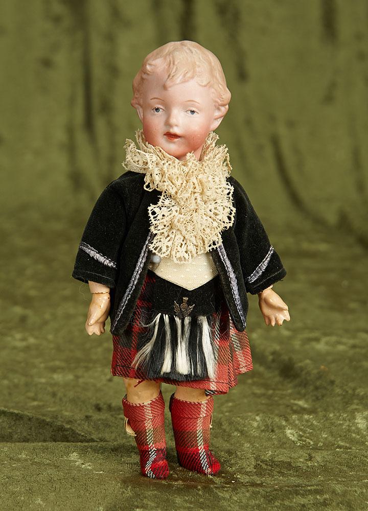 8" Rare German bisque character, 9167, by Gebruder Heubach, original Scottish costume. $800/1200