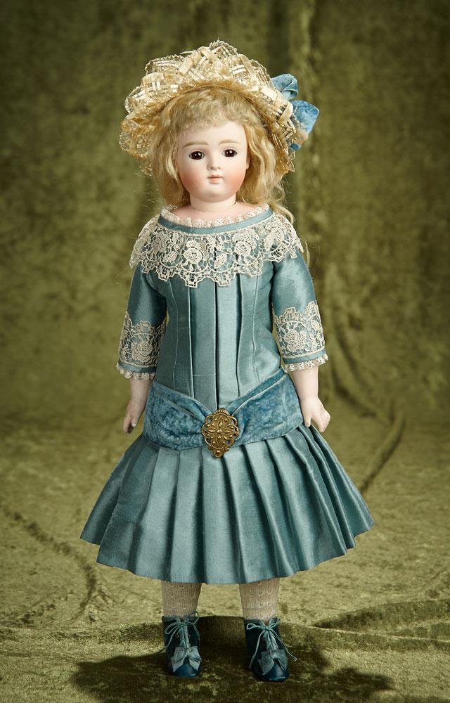 18" German bisque closed mouth doll by Kestner with beautiful silk costume. $800/1000