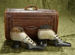 9"l. Leather bound case with fitted interior, and carved wooden shoes as pincushions. $400/500