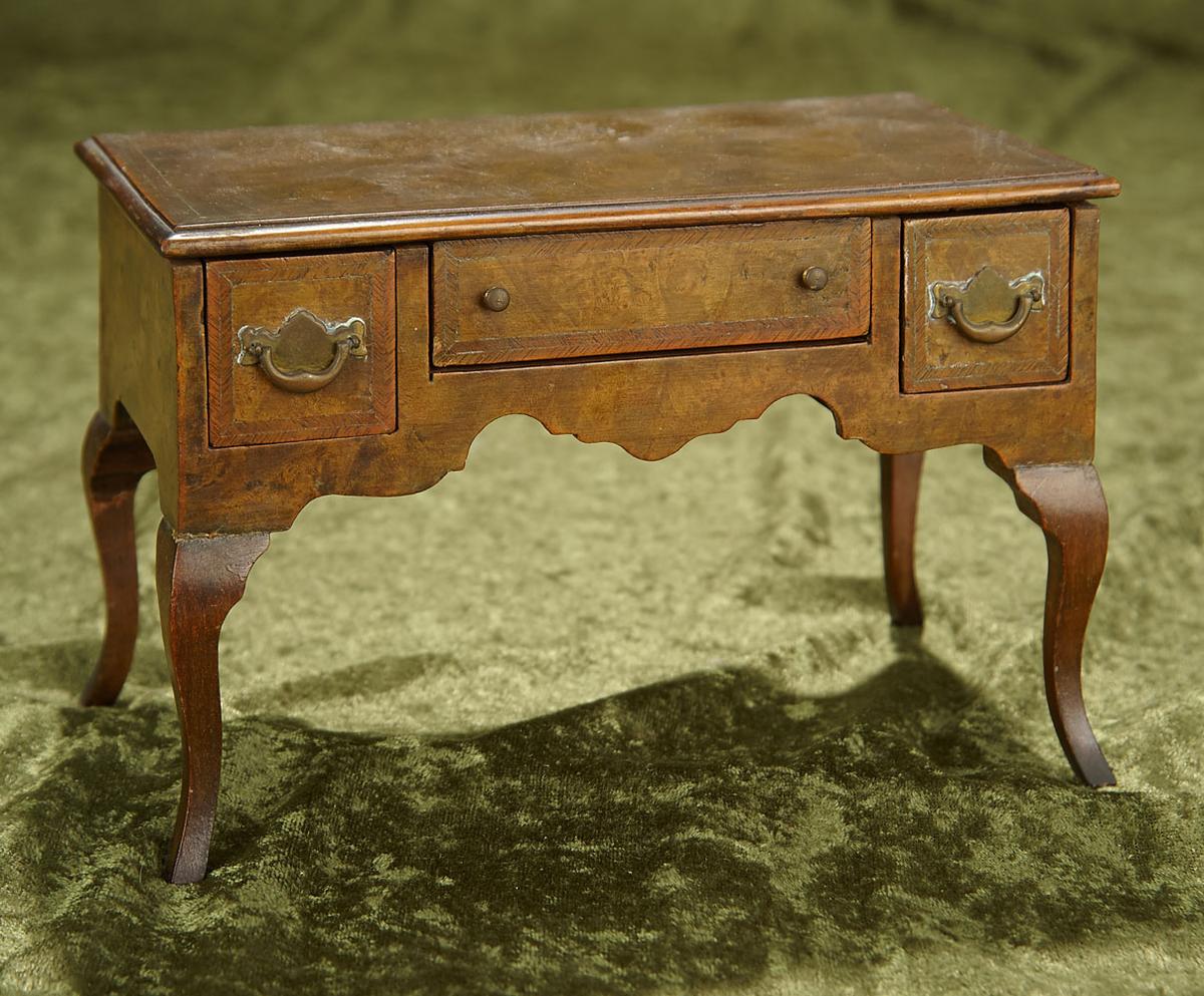 8"l. Fine early maitrise model library desk with burled walnut woods. $600/800