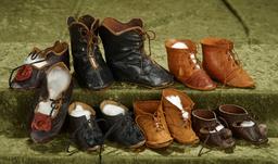 2 1/2"-4" Six pairs of antique kidskin doll shoes and boots. $400/600