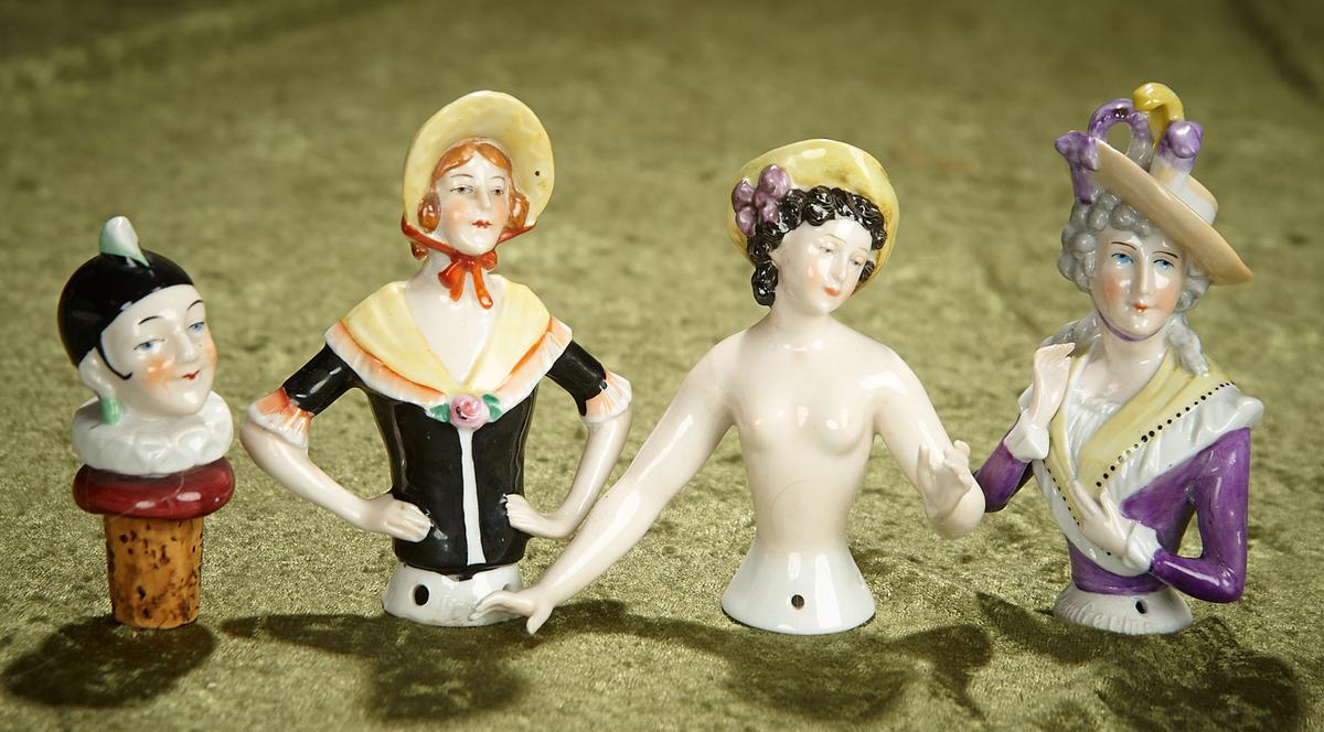 4" Three German porcelain half-dolls and cork bottle head, with sculpted decorations. $300/400