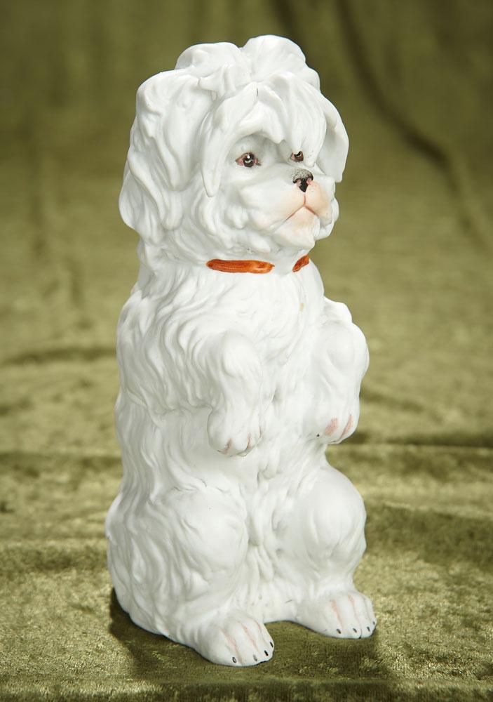 7" German all-bisque "Pup Begging for a Treat" by Gebruder Heubach. $400/500