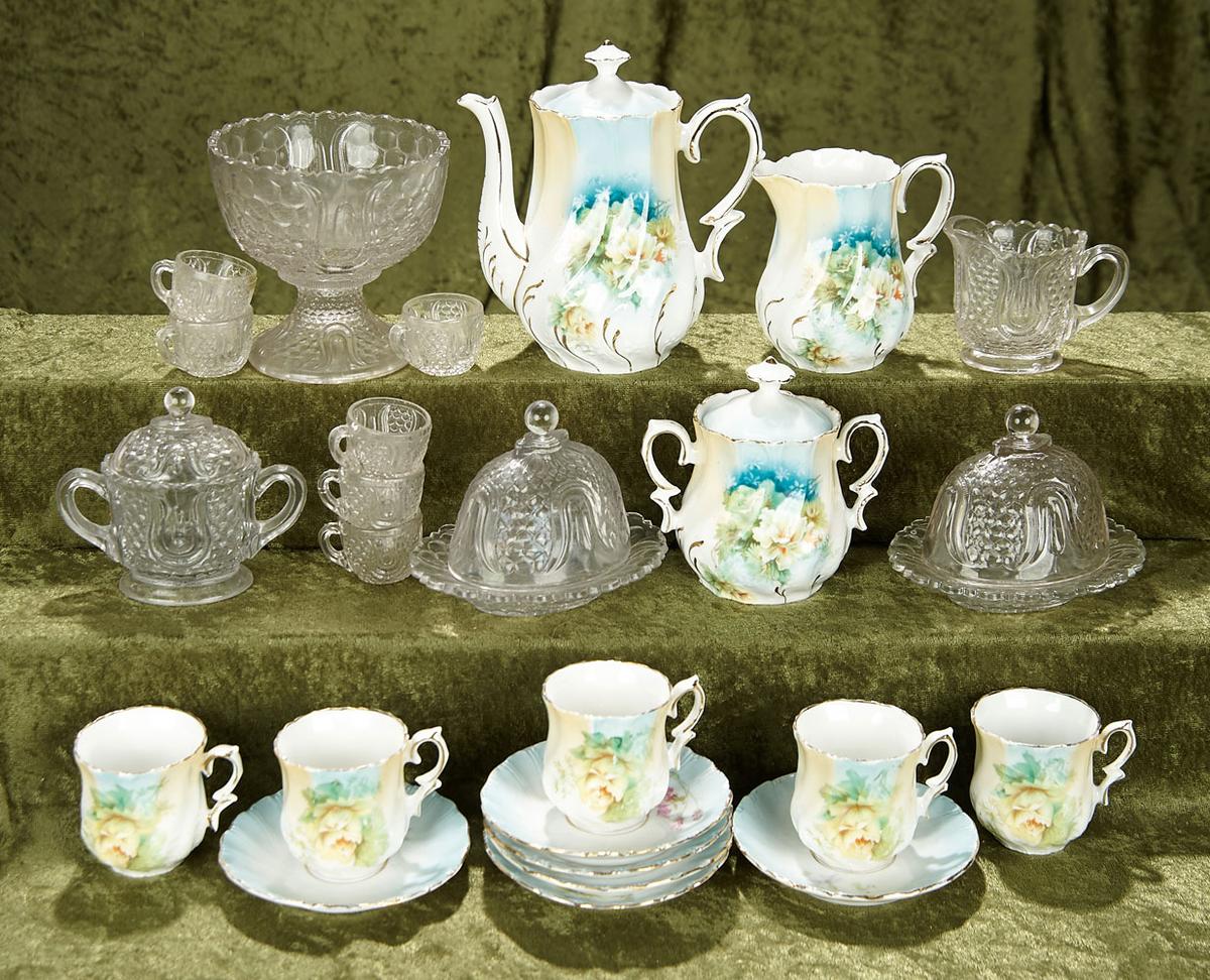 German doll's porcelain tea set and pattern glass dishes. $400/500