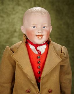 23" German bisque smiling character by Heubach with intaglio eyes, cloth body bisque lower arms.