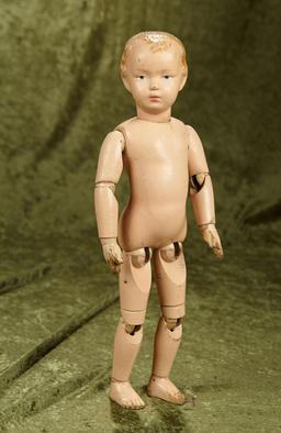 15" American wooden boy by Schoenhut with carved wood hair.