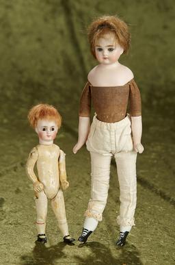 11" Pair of small German bisque shoulder dolls, one marked 3, and the other is Limbach.