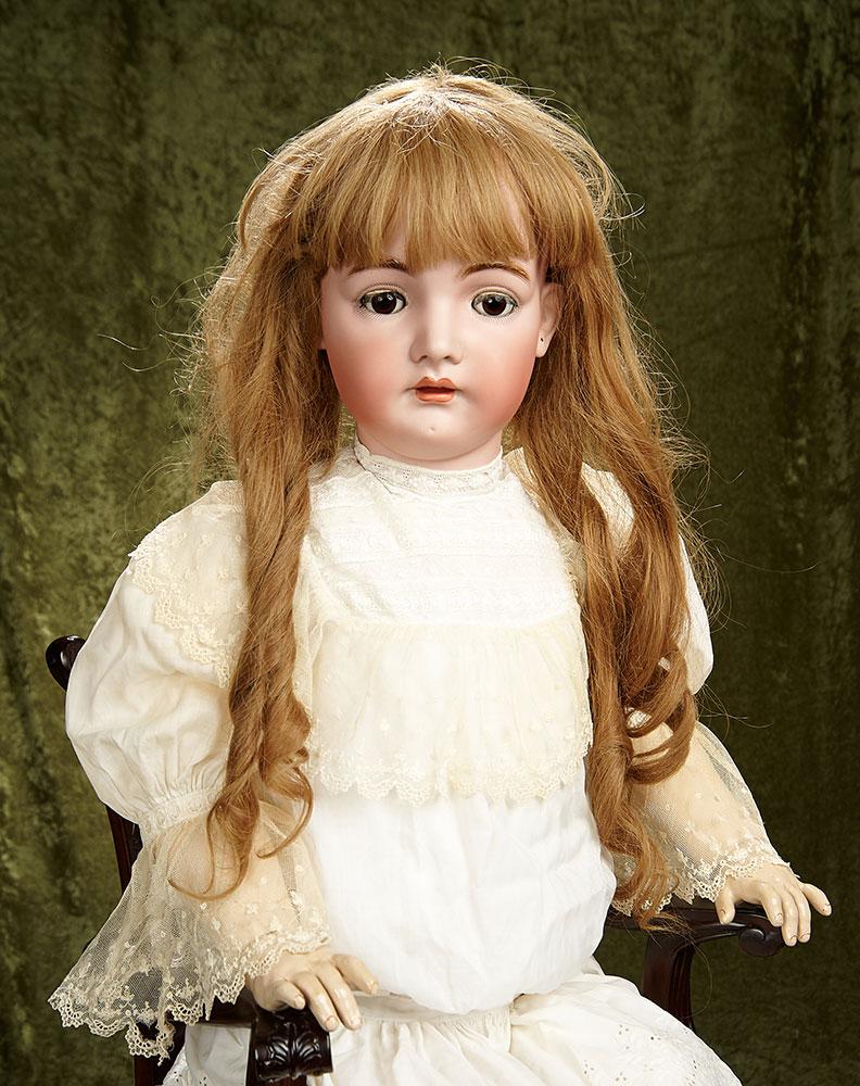 40" Grand German bisque child with brown glass sleep eyes by Kammer and Reinhardt. $1600/1900