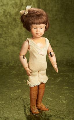 15" American wooden pouty-faced girl by Schoenhut with original shoes. $400/600