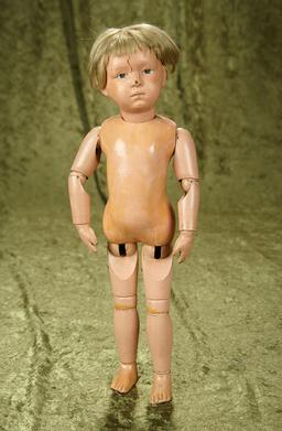 15" American wooden child by Schoenhut with original paint, albeit scuffed.