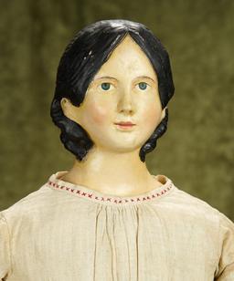 27" Early German paper mache lady doll with rare chignon. $1200/1400