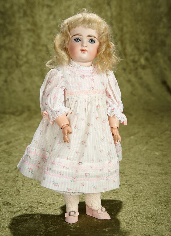 13" German bisque closed mouth child with original wig and body by Kestner. $1100/1300