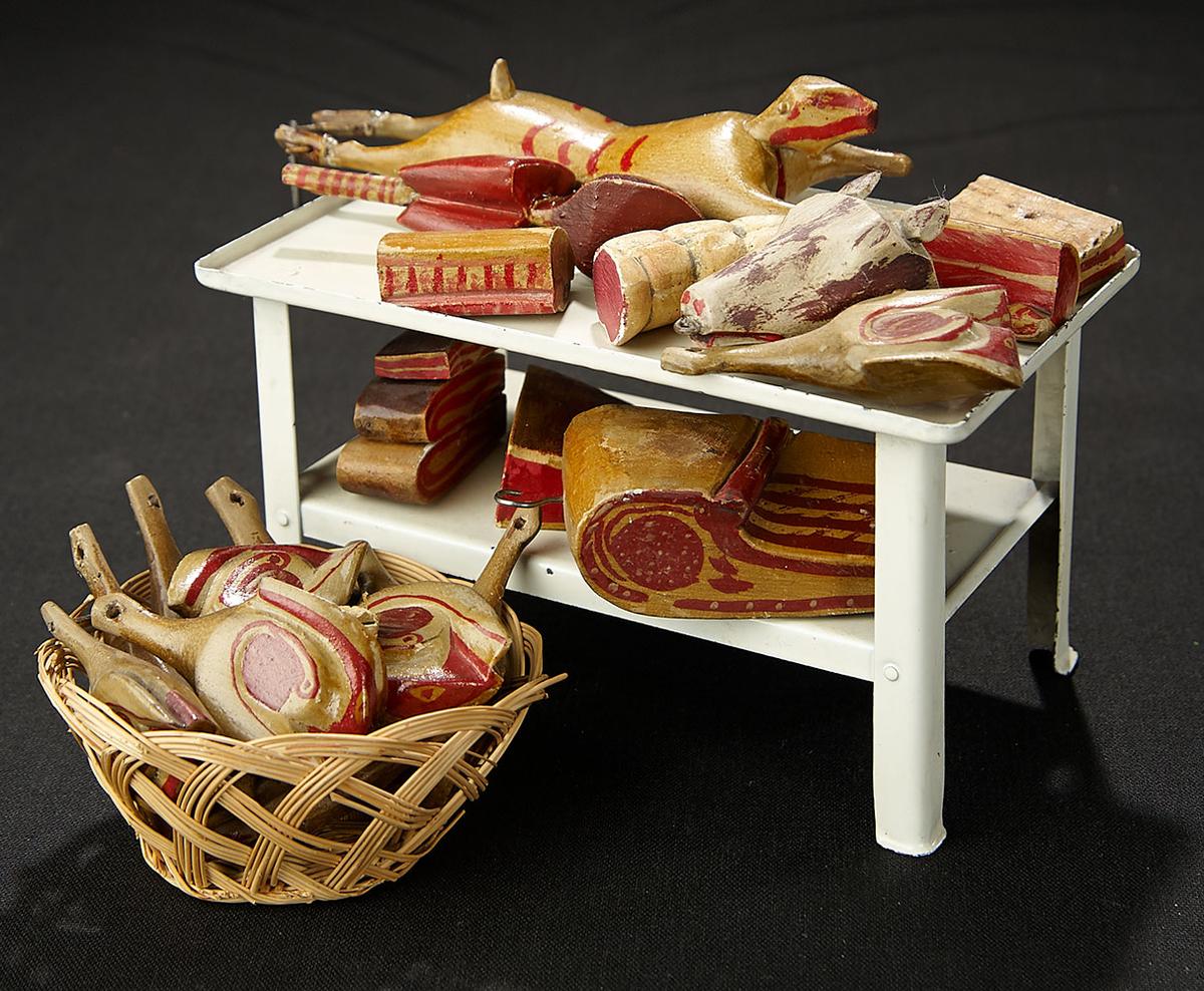 Tinplate Table with Assortment of Carved Wooden Meats, and Basket of Wooden Ducks 600/900