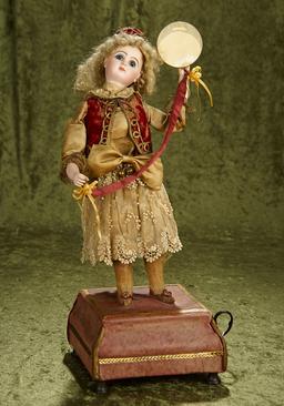 17.5" French musical automaton with Tete Jumeau bisque head in working condition.
