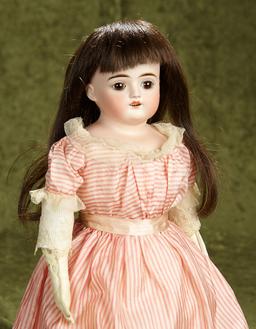 18" German bisque doll by Kestner with lovely antique costume. $400/500
