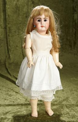 19" German bisque closed mouth doll, 949, by Simon and Halbig. $800/1000