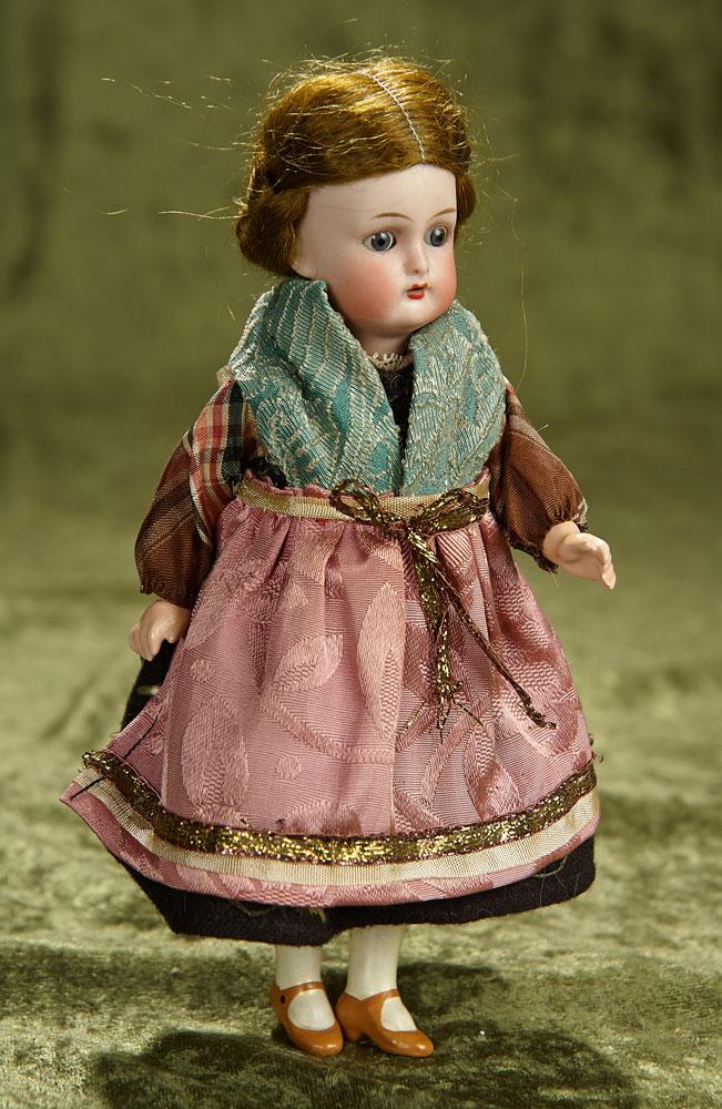 8" All-Original German bisque doll by K*R with wonderful wig and folklore costume. $400/500