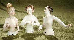 Three beautiful 5" German porcelain nude half-dolls with extended arms. $500/700
