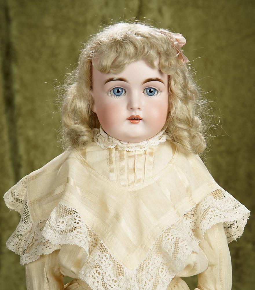 23" German bisque child, 147, by Kestner with original soft mohair wig. $300/400