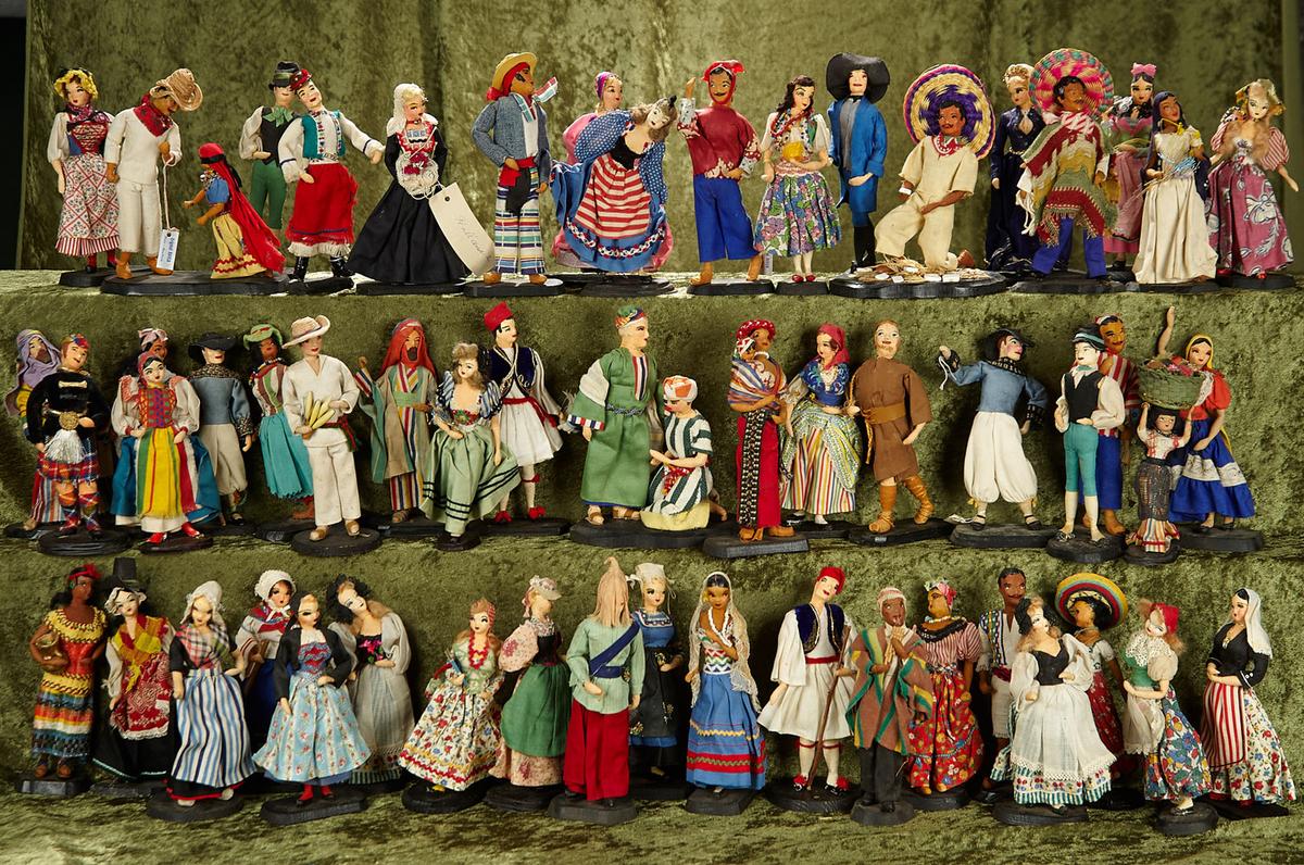 "5""-7"" Large group of vintage cloth souvenir country and culture dolls by Bernard Ravca.