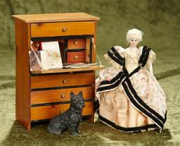 7" German bisque dollhouse lady by Simon & Halbig, with desk, books, and dog. $400/600