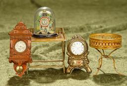 5"l. brown clock. Five German miniature tinware accessories for doll rooms. $400/500