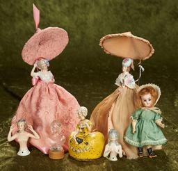 3"-11" Group of porcelain half-dolls, powder and lotion jars and a small German bisque Kestner doll.