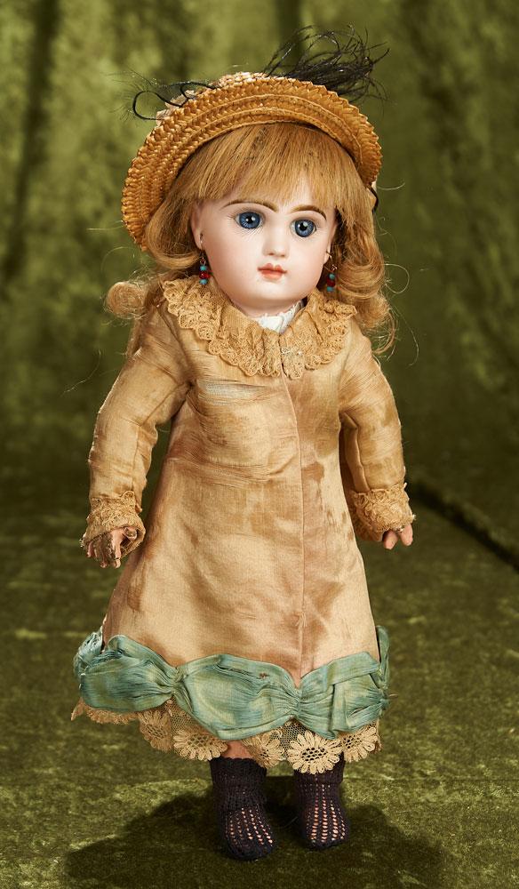 14" French bisque bebe, size 4, closed mouth by Emile Jumeau. $2200/2600