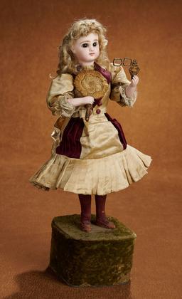 17" French bisque musical automaton "Little Girl with Fan and Lorgnette" $3000/4000