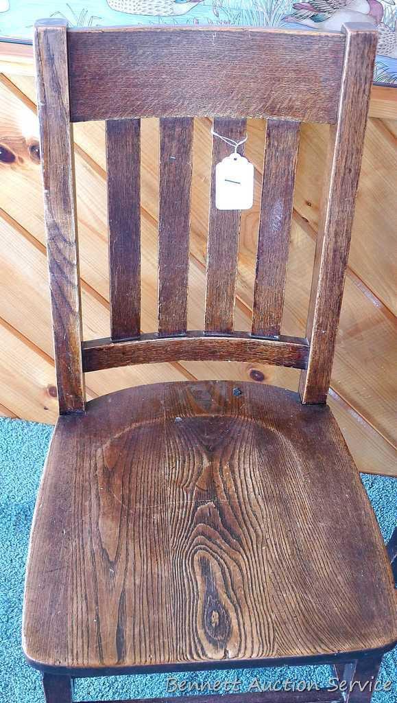 Three hardwood office chairs with iron braces are both sturdy and comfortable. Matches Lot #2 & 3.