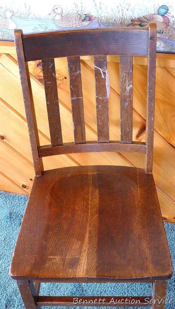 Three hardwood office chairs with iron braces are both sturdy and comfortable. Matches Lot #2 & 3.