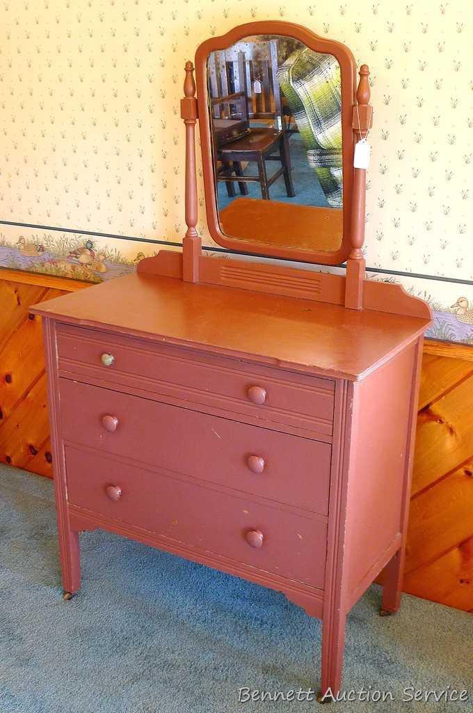 Vintage three drawer dresser with tilting mirror. Approx. 36" l x 18" d x 62" h. Drawers have dove