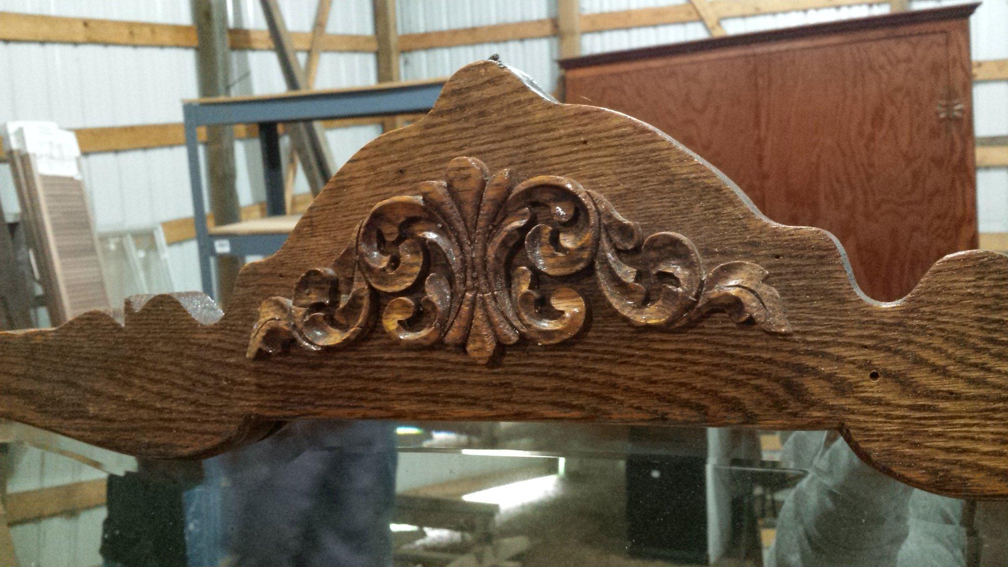 Antique serpentine four drawer dresser and wall mirror. Dresser is approx. 42-1/2" w x 19"d x 34" h.