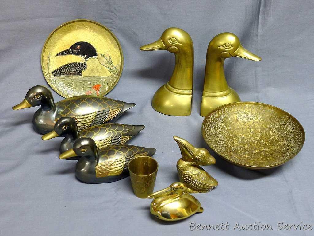 Brass pieces including 6" tall duck book ends, 6-1/2" diameter bowl, set of three ducks, loon