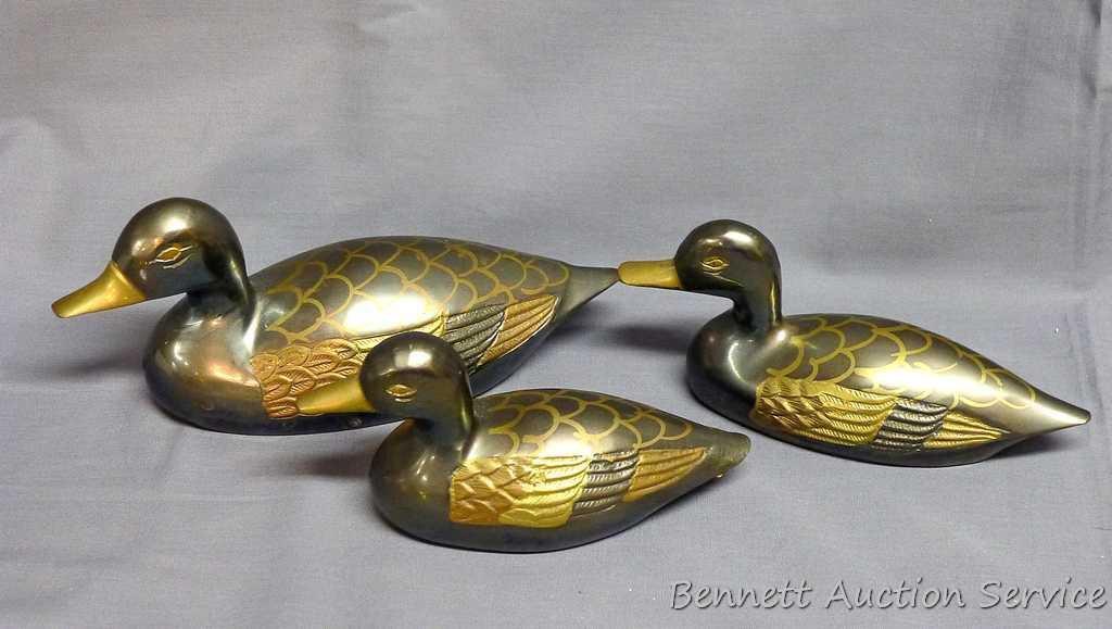 Brass pieces including 6" tall duck book ends, 6-1/2" diameter bowl, set of three ducks, loon