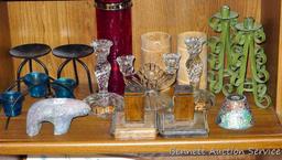 Candle holders up to 9-3/4" tall. Some are glass, some wood, some metal. Nice assortment.