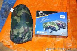 Camouflage ATV cover, plus two tarps in fair condition.