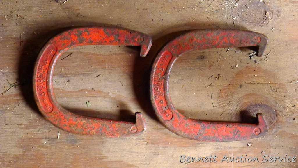 Four Champion throwing horses shoes; plus a pair of Phoenix throwing shoes;