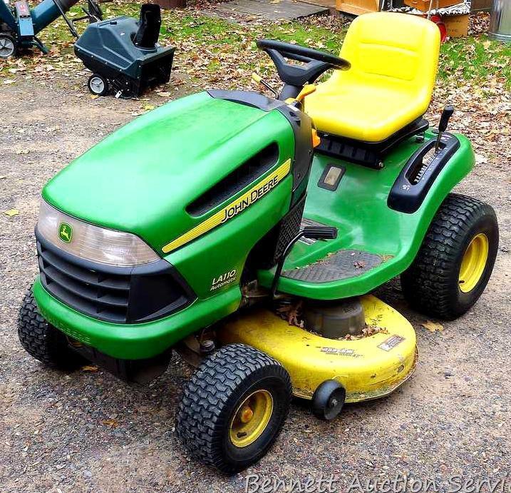 John Deere LA110 automatic hydrostatic lawn tractor with 42" mulching deck. Starts and runs fine.
