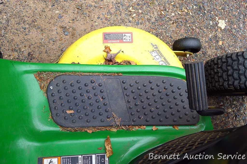 John Deere LA110 automatic hydrostatic lawn tractor with 42" mulching deck. Starts and runs fine.