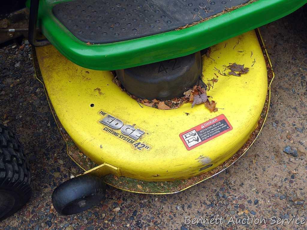 John Deere LA110 automatic hydrostatic lawn tractor with 42" mulching deck. Starts and runs fine.