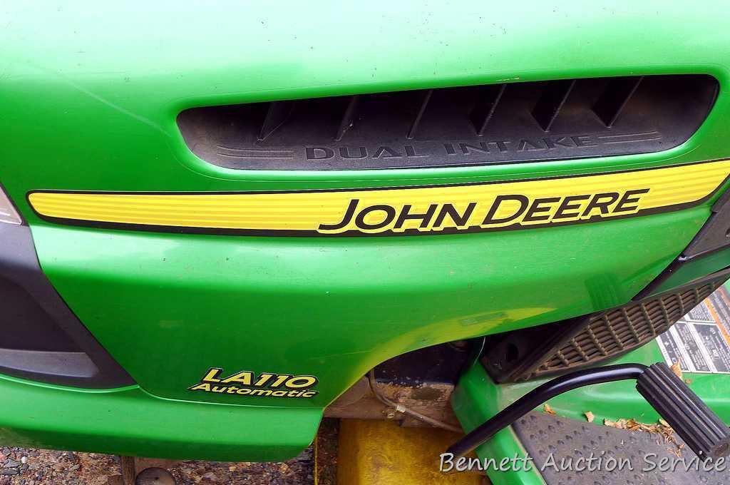 John Deere LA110 automatic hydrostatic lawn tractor with 42" mulching deck. Starts and runs fine.