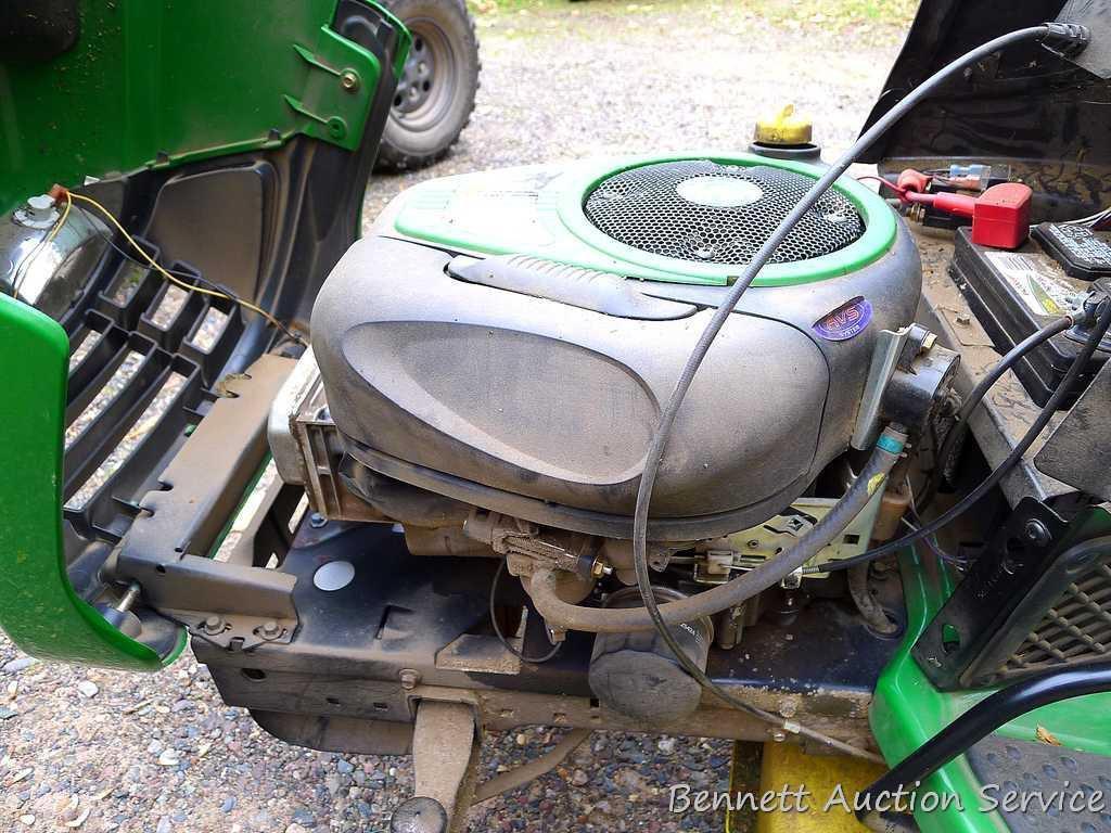 John Deere LA110 automatic hydrostatic lawn tractor with 42" mulching deck. Starts and runs fine.