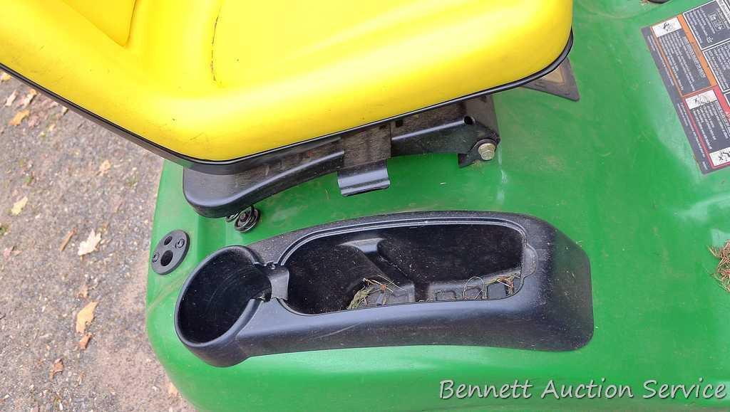 John Deere LA110 automatic hydrostatic lawn tractor with 42" mulching deck. Starts and runs fine.