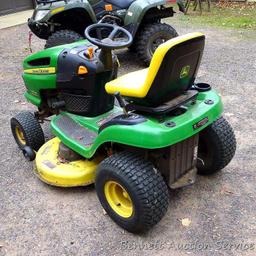 John Deere LA110 automatic hydrostatic lawn tractor with 42" mulching deck. Starts and runs fine.