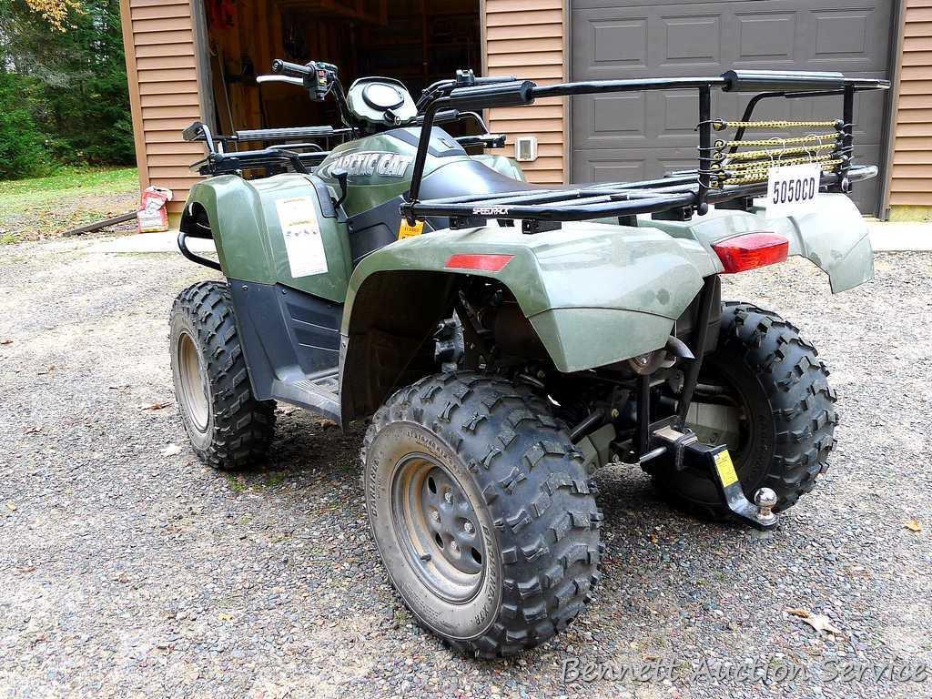 Arctic Cat 500 4WD ATV with only 81 miles. Tires still have mold nubs. Vinyl seat is great. Heavy