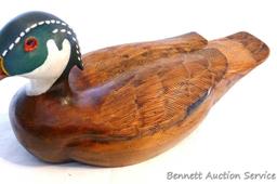 Wood duck carved out of pine by Irv Phillips. Approx. 14" long with nice color and details.