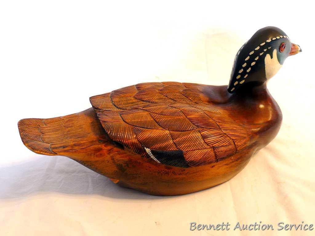 Wood duck carved out of pine by Irv Phillips. Approx. 14" long with nice color and details.