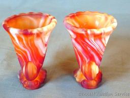 Pair of Imperial Glass red slag glass Cornucopia No. 123. Both are in good condition.