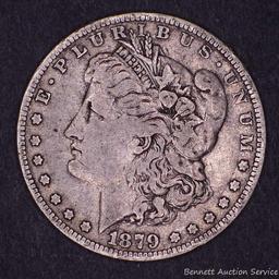 1879 O Morgan silver dollar.